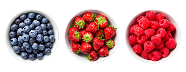 Top view of blueberries, strawberries and raspberries in bowls over isolated transparent background - obrazy, fototapety, plakaty