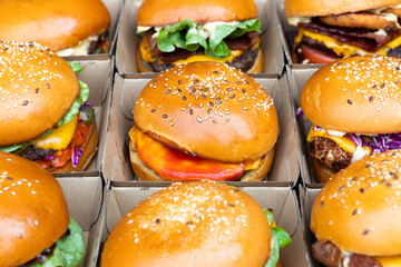 Appetizing Burgers in Neatly Arranged Paper Boxes 
