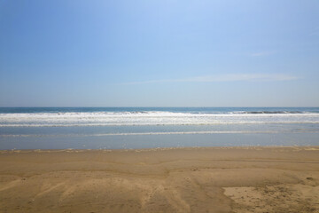Fototapeta na wymiar beach and sea, Incredible beauty of white sand beach with walkers filmed in 4k