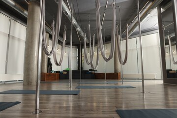 Many hammocks for fly yoga in studio
