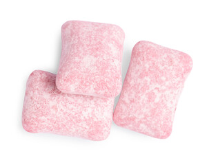 Tasty pink bubble gums isolated on white, top view