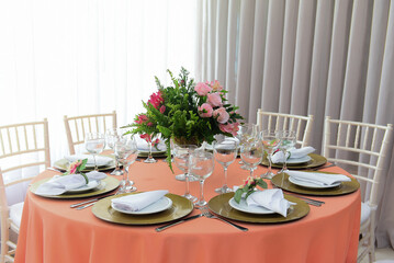 table and chairs, table set for a wedding reception,dining room with dining table, room interior, dining room, table setting,  decoration with natural flowers, table decorated with flowers