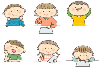 机で何かを書いている子供セット