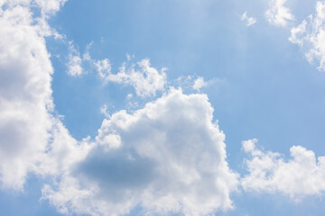 White bird clouds under the blue sky. sunny weather
