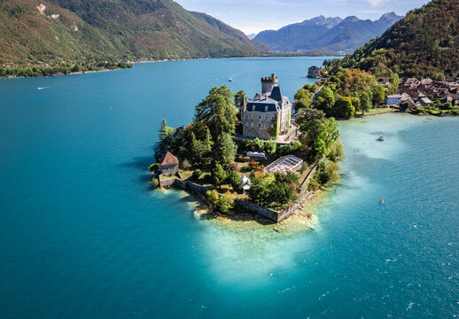 Aerial view of Duingt castle or Chateau de Duingt in Annecy lake, Haute Savoie, France