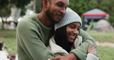 Love, romance or happy couple camping in nature enjoying holiday or vacation to relax together. View, smile or romantic man hugging, laughing or smiling with an Indian woman on fun date outdoors - Powered by Adobe