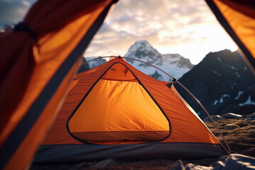 Discover the beauty of nature with a vintage tent on a hill beneath the mountains, under a dramatic sky. AI Generative.