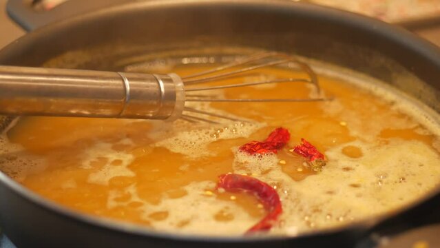  cooking dhal in a large pan 