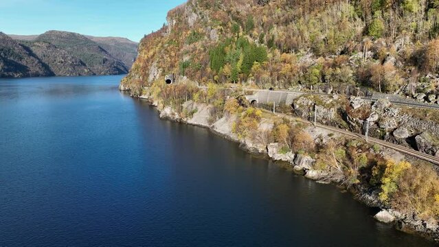 Railway and road E16 with tunnels at Hetteneset near Stanghelle, Norway