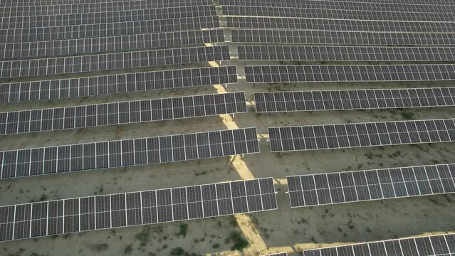 solar farm or pv plant aerial  circle view in sunset