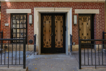 View of a Beautiful House Exterior and Front Door Seen on a Manhattan NYC. High quality photo