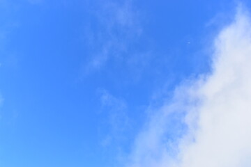 beautiful blue sky with white cloud, natural background in springtime