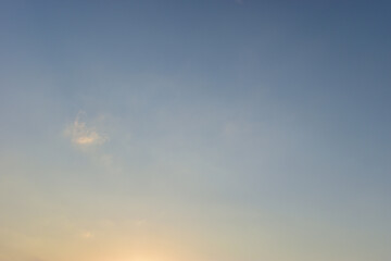 beautiful blue sky and cloud with golden ray sunrise in the morning, natural background