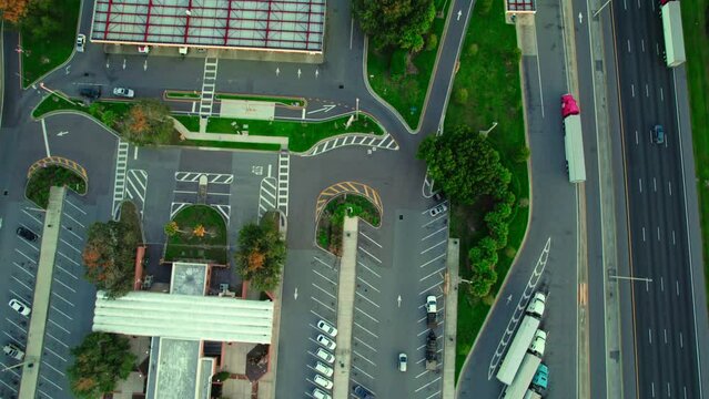 Top down aerial Turkey Lake Service Plaza, Orlando Florida. Rest area full with semi trucks, dry van, reefer.