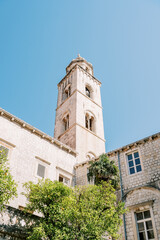 Fototapeta na wymiar High bell tower of the Dominican monastery. Dubrovnik, Croatia
