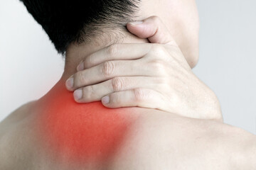 Man has neck and shoulder pain He squeezed and massaged the pain in the inflamed neck muscles. From...