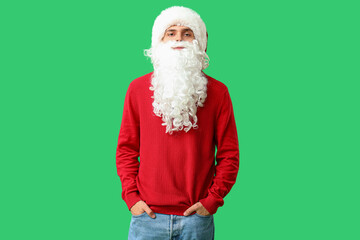 Fototapeta na wymiar Santa Claus on green background