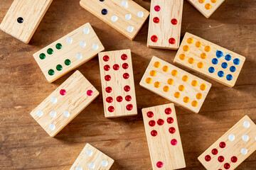 Domino Games on wooden background