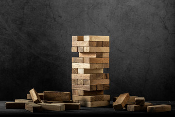 wooden block game on black background