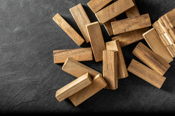 wooden block game on black background