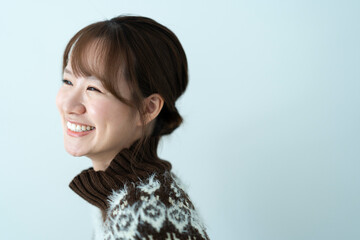 Fototapeta premium ニットを着た女性