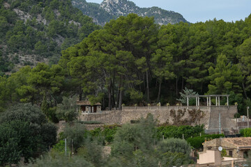 Medieval historic old house facades architecture in small alleys, streets and backstreets of Soller town on Balearic Island Mallorca, tourist destination in mountains station of Orange Express train