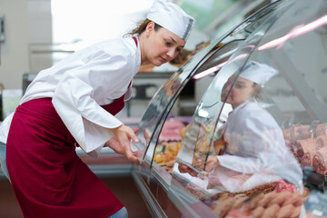 portrait of pretty butchery woman working