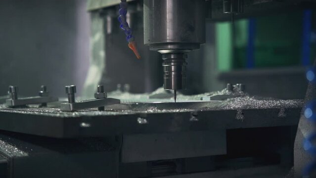 molding machine shaping a mold slow motion medium shot