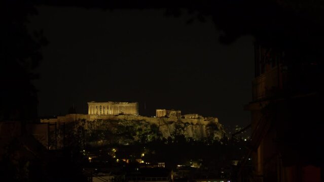 Illuminated Acropolis view at night in Athens