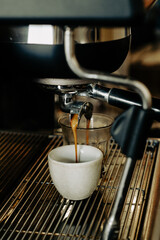 espresso machine pouring coffee