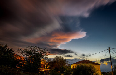 Long exposure of heavy storm clouds at night.