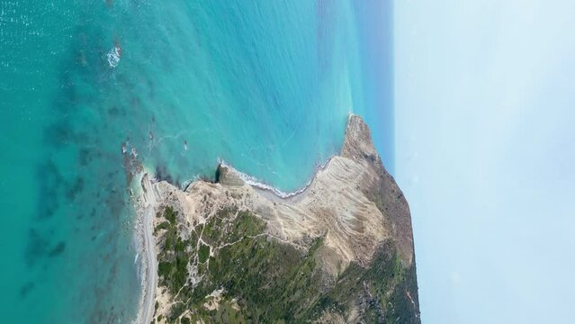 Aerial view of the natural landscape of Cyprus. Golden sandy beaches on the shores of the Mediterranean Sea with a beautiful landscape of mountain nature. High quality 4k footage