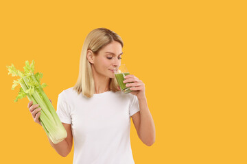 Woman with celery bunch drinking tasty juice on orange background. Space for text