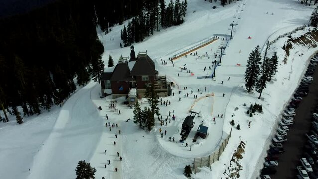 Ashland, Oregon, USA, Winter 2023.  Mt Ashland Ski Area.  Orbiting the Lodge with the learning area and the beginner ski lift.