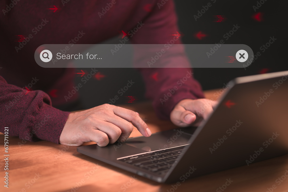 Poster User using a laptop computer clicking internet search bar. SEO technology networking engine optimization internet with search bar. Searching browsing internet data information concept.