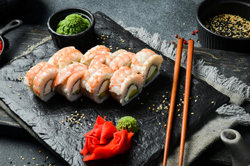 Traditional fresh Japanese sushi rolls with shrimp. Served with wasabi sauce and pickled ginger....