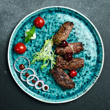 Lyula kebab made of veal. Barbecue menu. Azerbaijani cuisine. Top view.