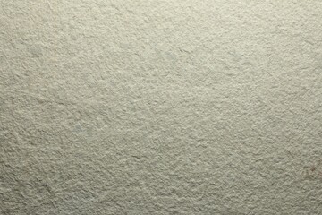 Texture of light stone surface as background, closeup