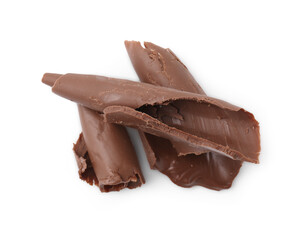Tasty sweet chocolate shavings isolated on white, top view
