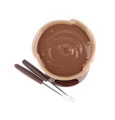 Fondue pot with melted chocolate and forks isolated on white, top view