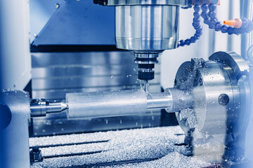 Working closeup CNC turning cutting metal Industry machine iron tools with splash water. - obrazy, fototapety, plakaty