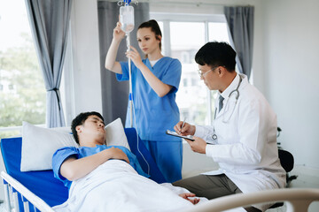 Doctors explaining the symptoms to a patient in hospital
