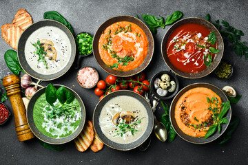 A set of dietary colored vegetable soups. In a bowl. The concept of vegetarian food. Top view.