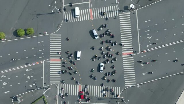 Top view of morning traffic at intersection in Ho Chi Minh City, Vietnam.