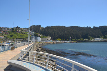 a boardwalk in a port in southern Chile