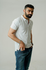 A man in a t-shirt looks relaxed and casual, with short sleeves and a comfortable fit.