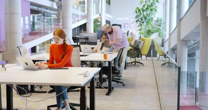 A diverse group of colleagues collaborates in modern offices, showcasing their collective problem-solving skills and innovative approach to address a variety of business challenges.