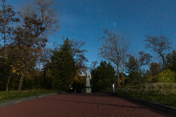 Starry sky in the city. Panoramic view. Ukrainian city under the stars. Natural night view in the city of Dnepr. Background image.