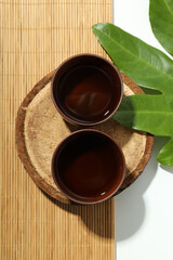 Asian tea concept, traditional dishes on a light background background.