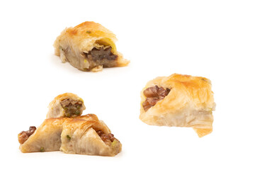 Delicious sweet baklava with walnuts isolated on white background.